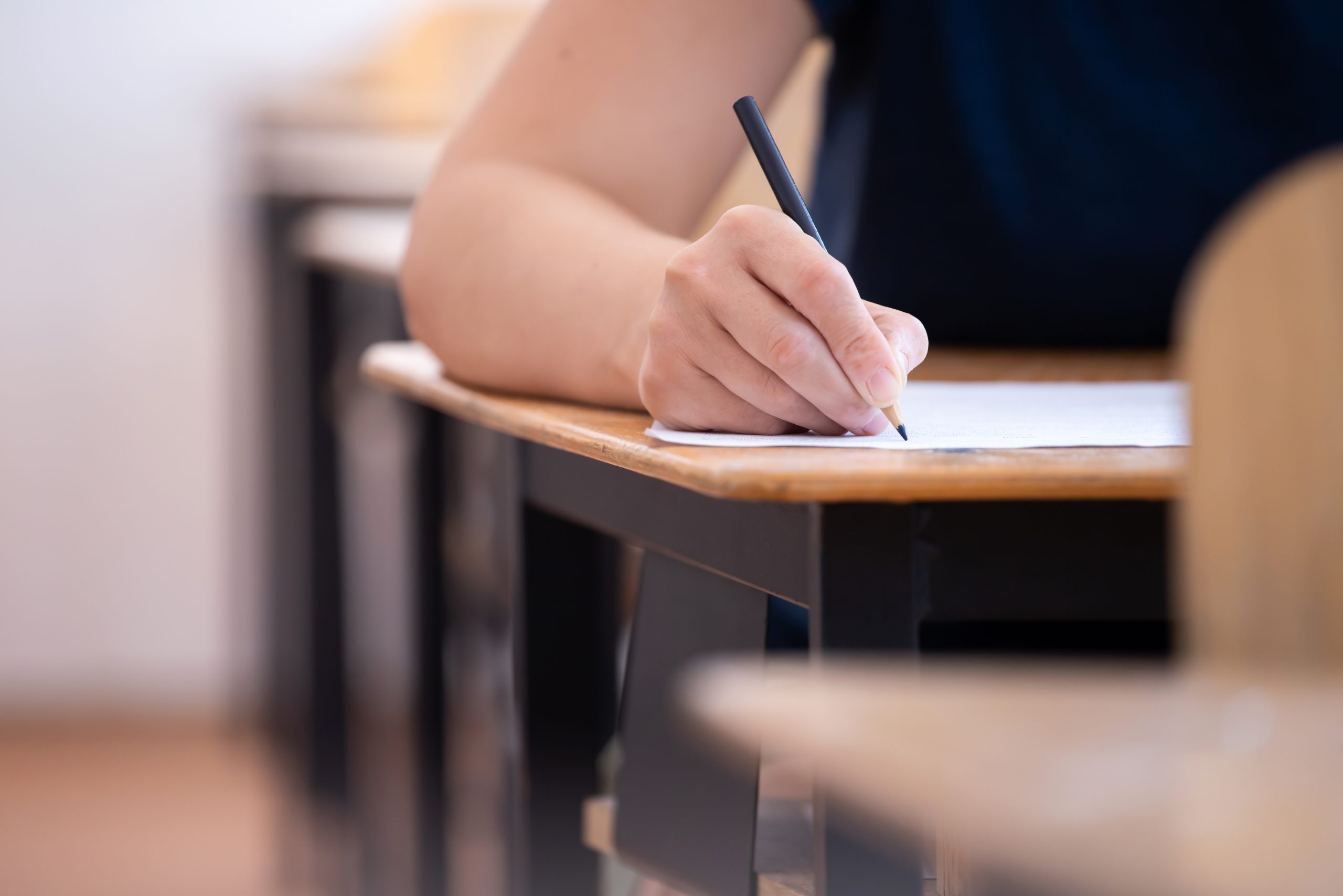A student writing during an exam